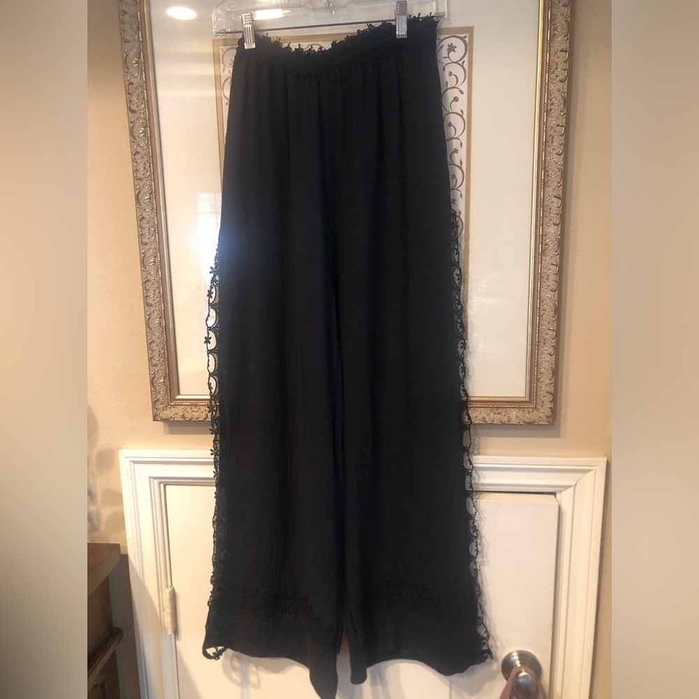 Surf Gypsy black cotton beach pants with lace open sides